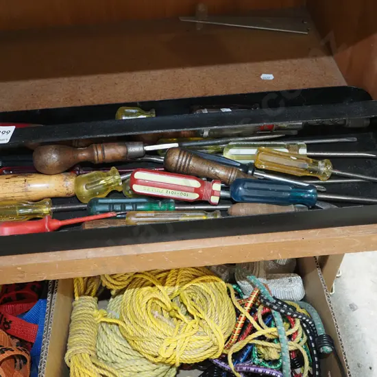 metal tray and various screwdrivers