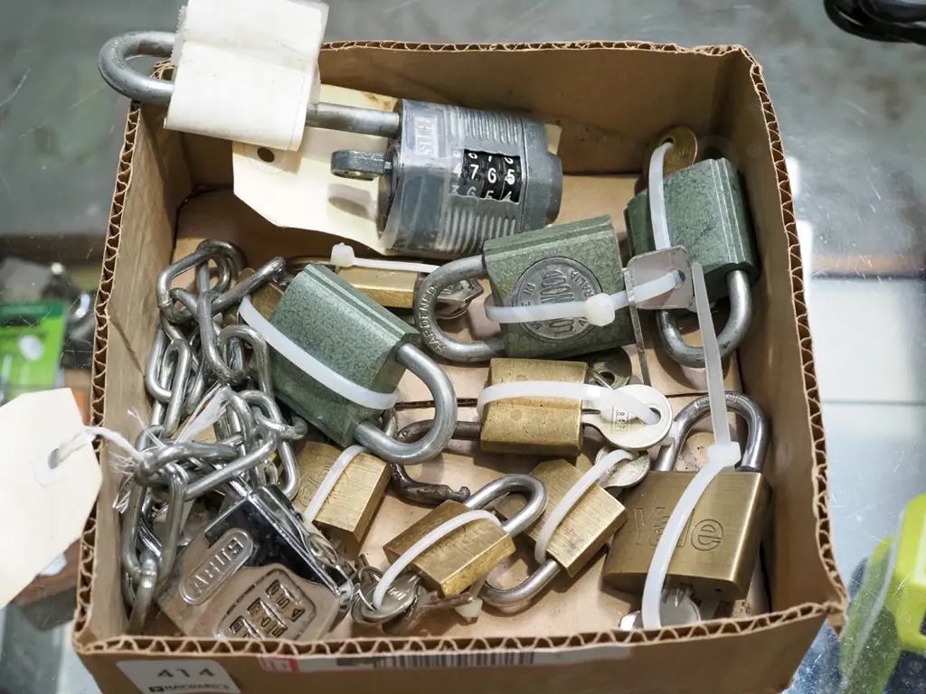 box of various keys and padlocks Image 1++