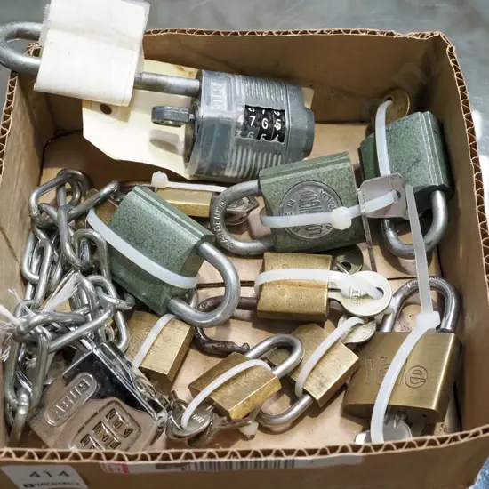 box of various keys and padlocks