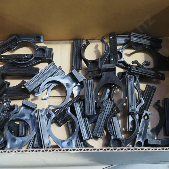box; black plastic fishing rod clips