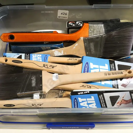 container of paint brushes