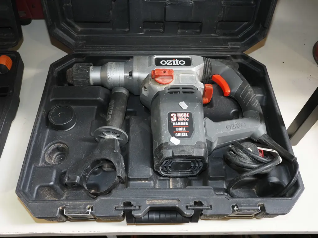 cased Ozito hammer drill Image 1++