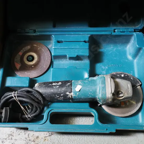 cased Makita angle grinder