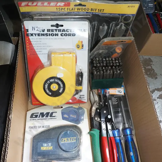 box; 15 piece wood bit set, powered tape measure, tin snips etc
