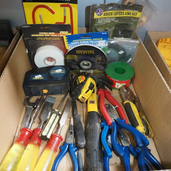 box; chisels, hammer, vice grips, mounting tape etc