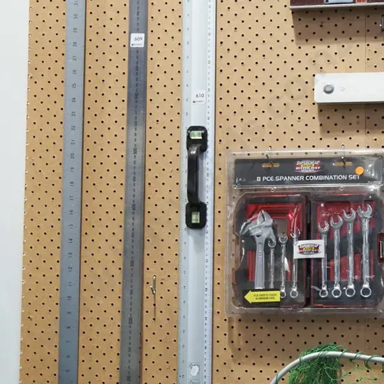 metal ruler with levels and handle