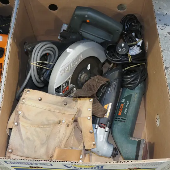 box; builder's belt, multi tool, circular saw