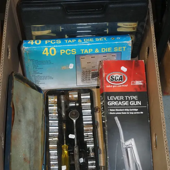 box; grease gun, socket set, tap and die set