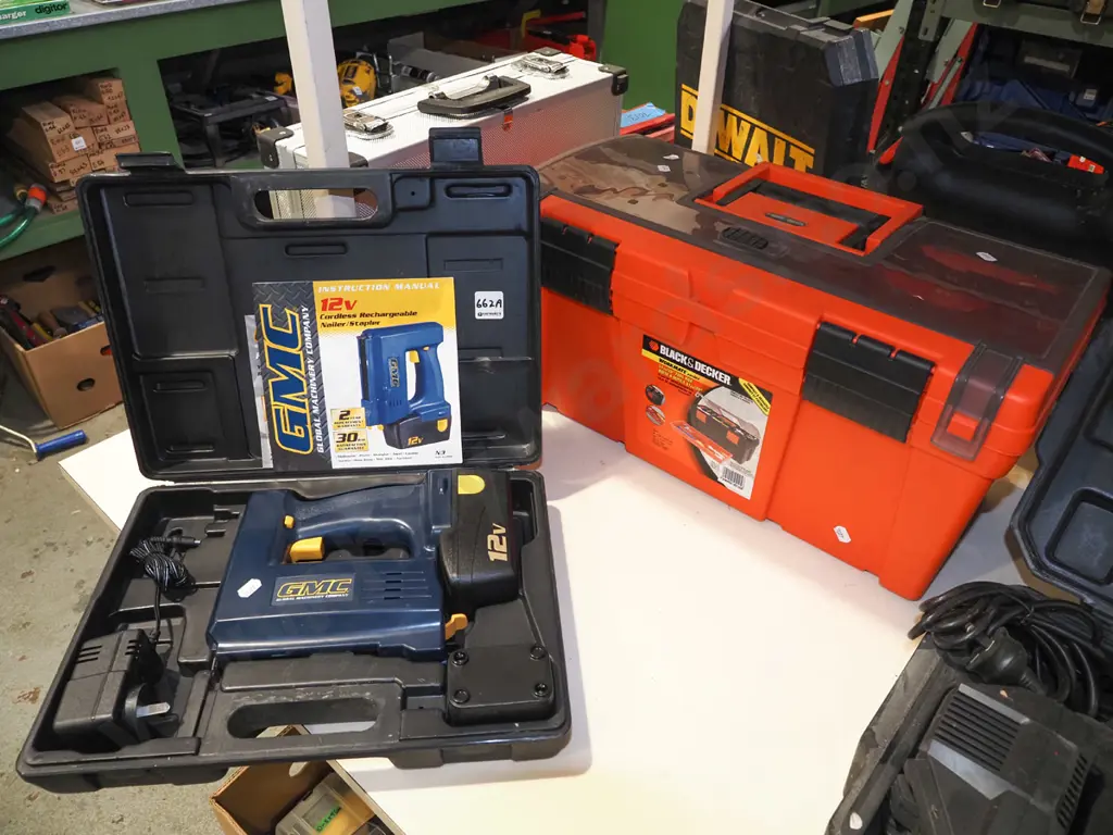 cased GMC 12V cordless nailer, orange plastic Black and Decker tool box Image 1++