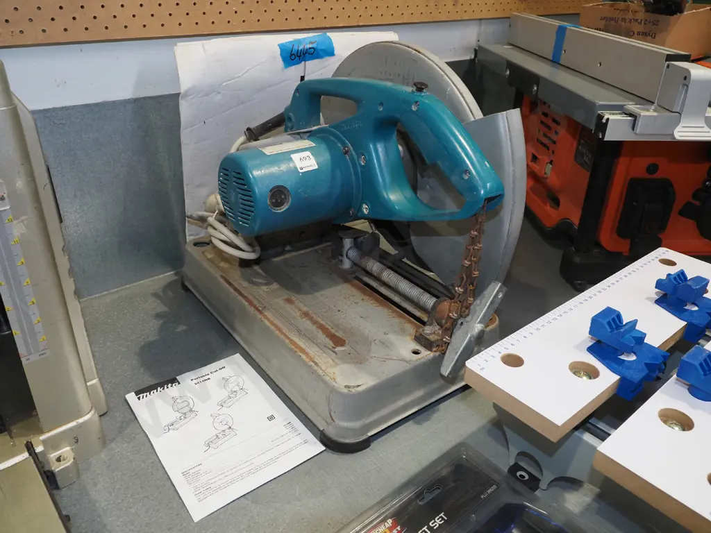 Makita 2414NB cut off saw with additional blade Image 1++