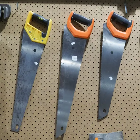 3x hand saws - black dots