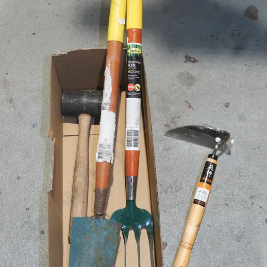 box; garden tools, rubber mallet