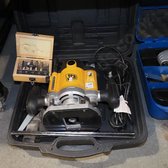 cased JCV plunge router and box of router bits