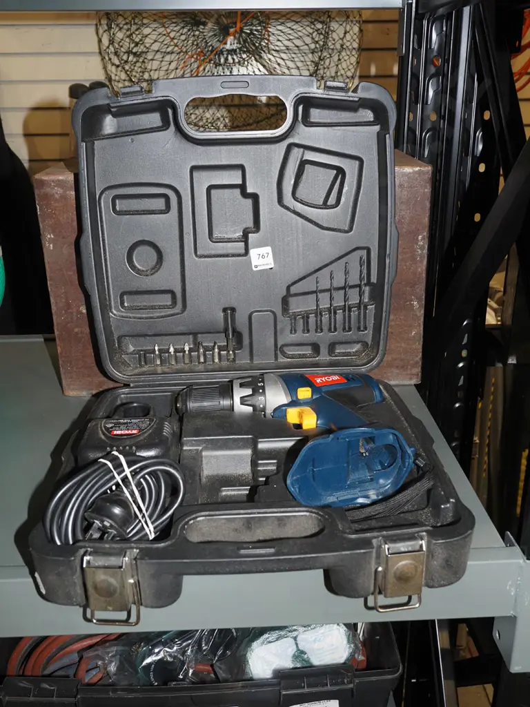 cased Ryobi battery drill - drill, charger - no battery Image 1++