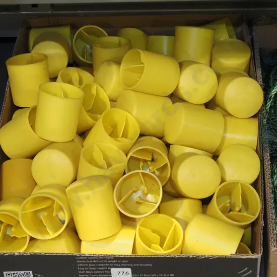 boxed yellow plastic re-bar safety caps