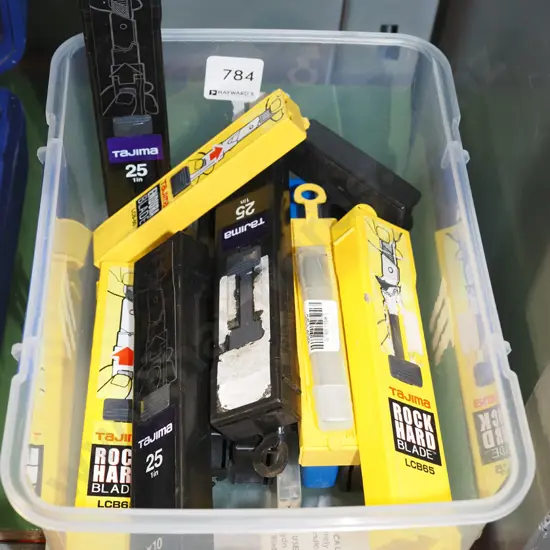various craft knife blades in container