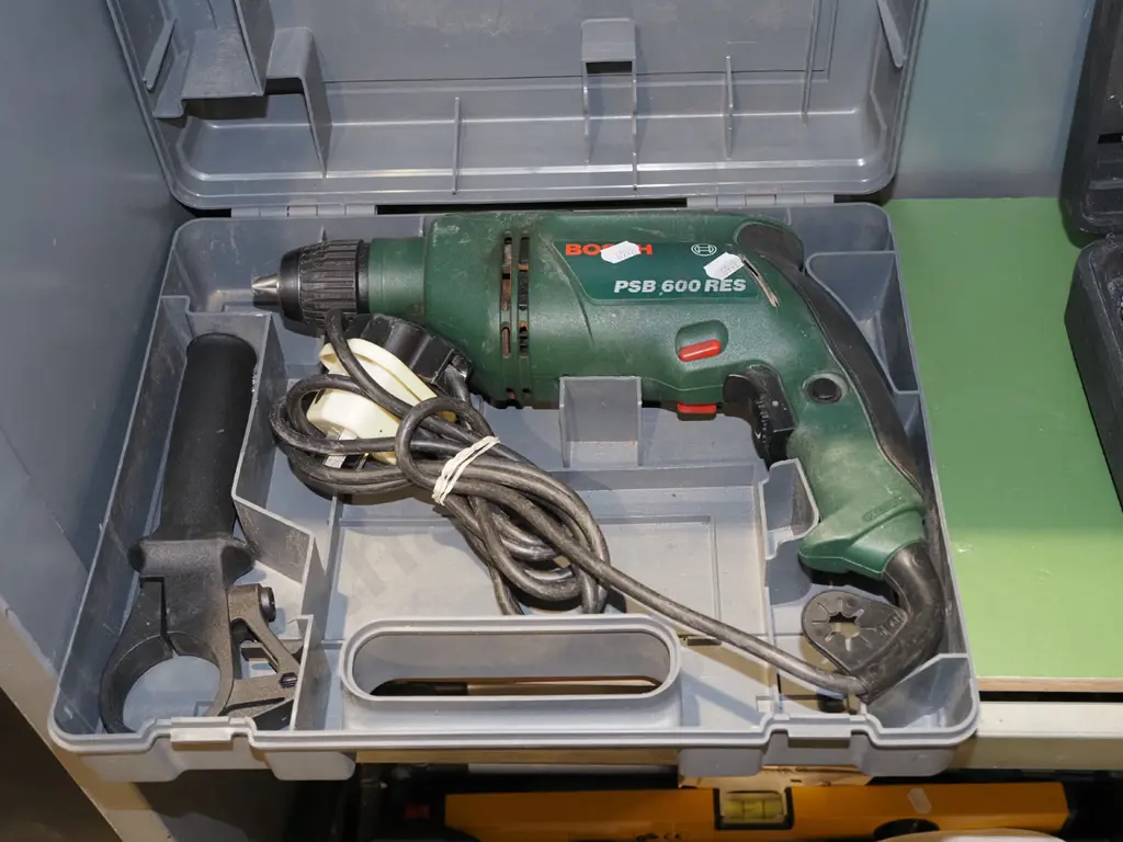 Bosch corded drill with English plug and adaptor Image 1++
