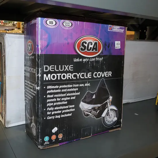 boxed SCA Deluxe motor cycle cover