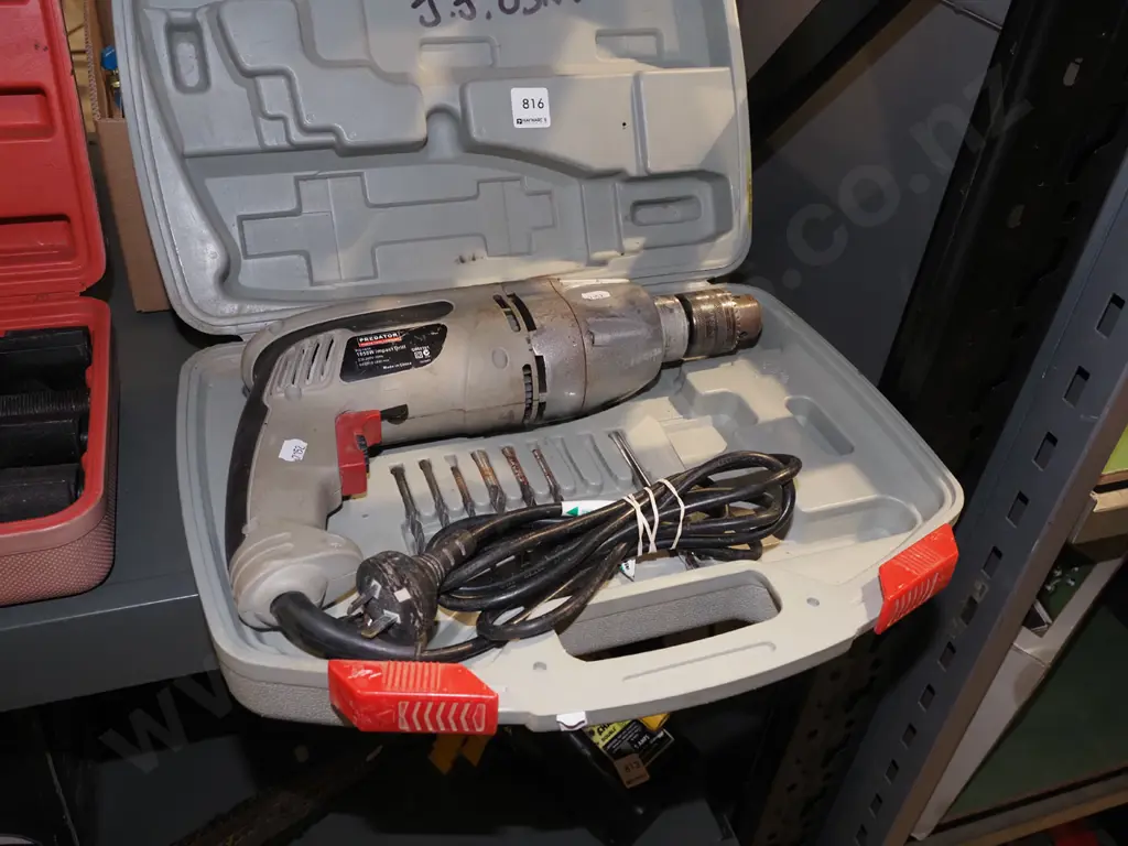 cased Predator drill Image 1++