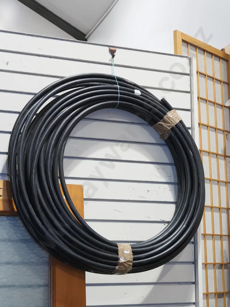 roll of black alkythene irrigation pipe Image 1++