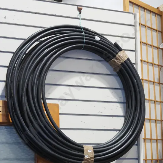 roll of black alkythene irrigation pipe
