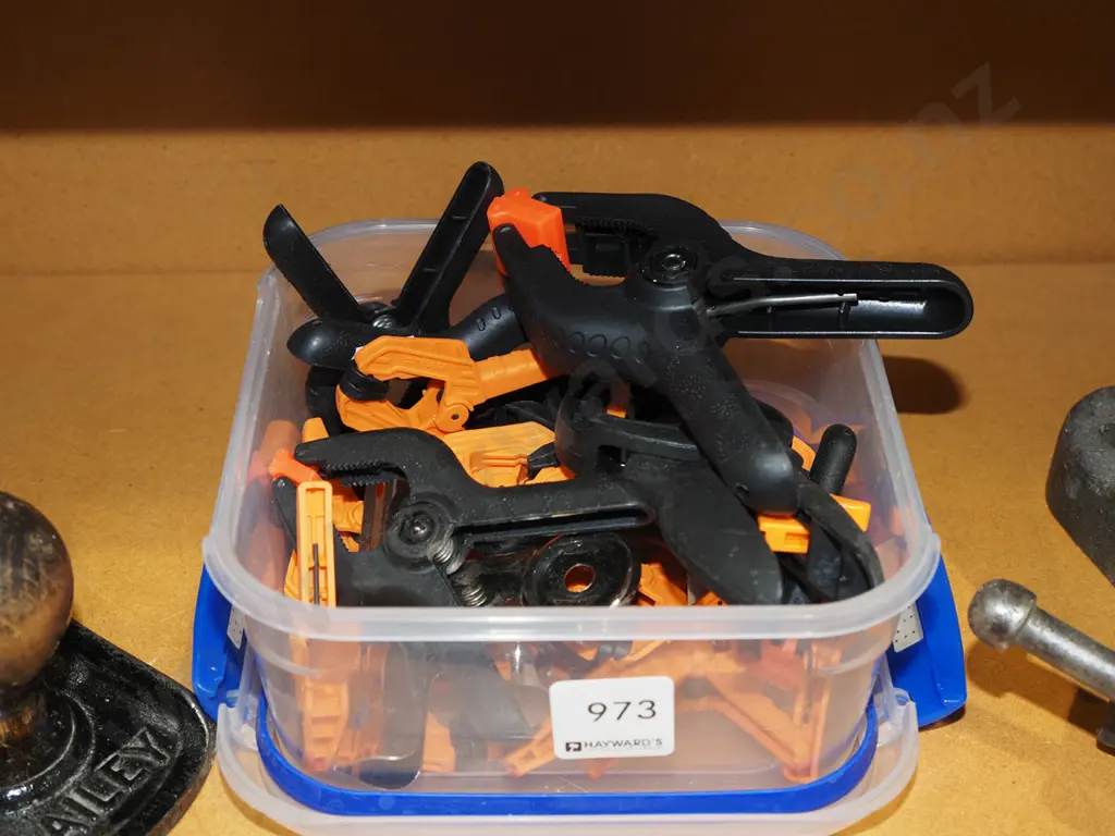 box of small plastic clamps Image 1++