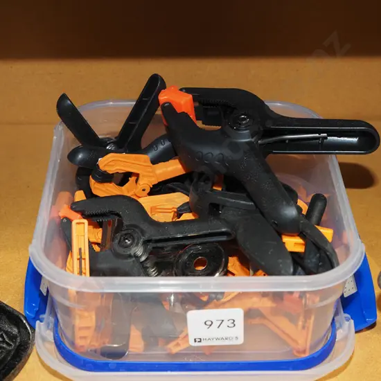 box of small plastic clamps