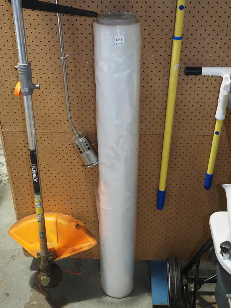 roll of clear plastic W1120 Image 1++