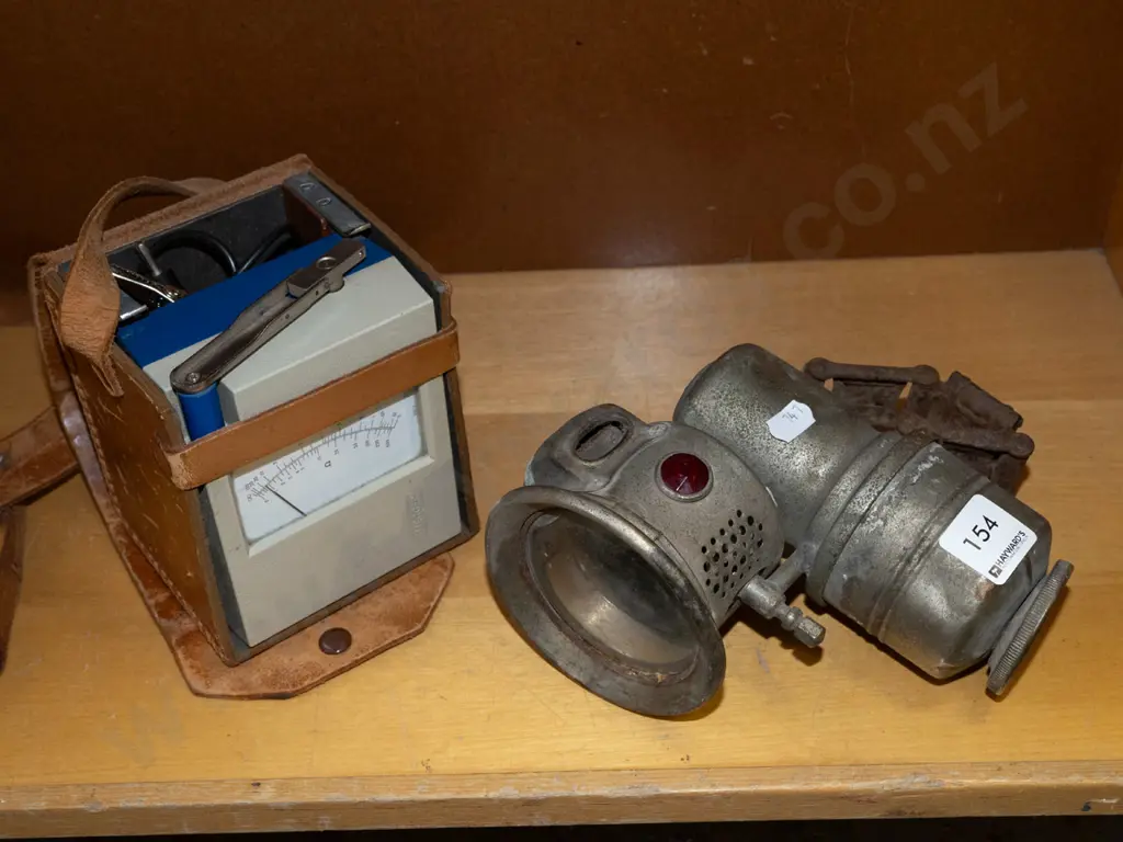 leather cased voltmeter, carbide bike lamp Image 1++