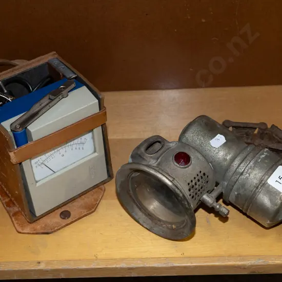 leather cased voltmeter, carbide bike lamp