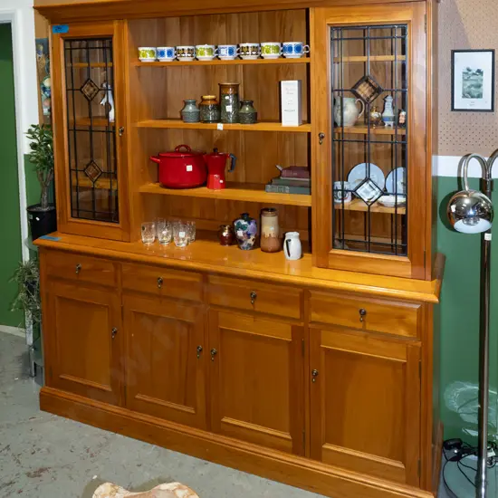 solid kauri wall unit with 2x leadlight doors, 4x solid wood doors, 4x drawers
