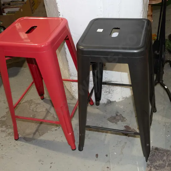 charcoal and red metal bar stools