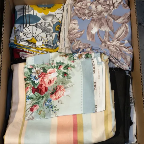 box of fabric pieces