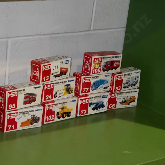 10 boxed Tomy die-cast toy vehicles