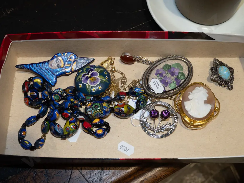 tray; brooches, beaded necklace Image 1++
