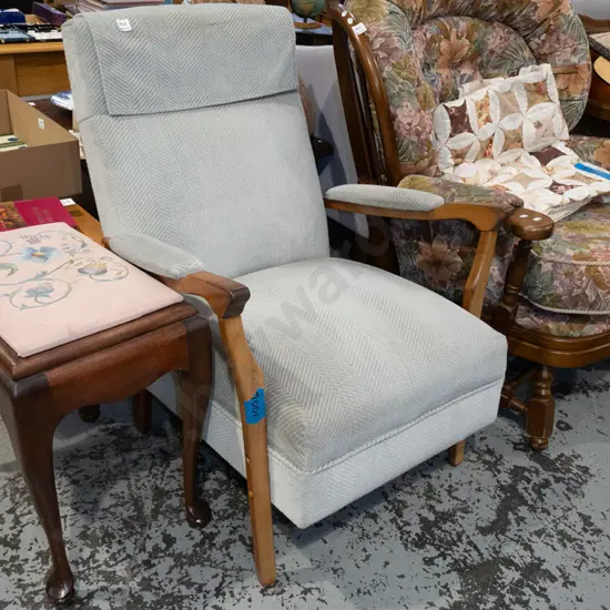 teal upholstered mid century fireside chair