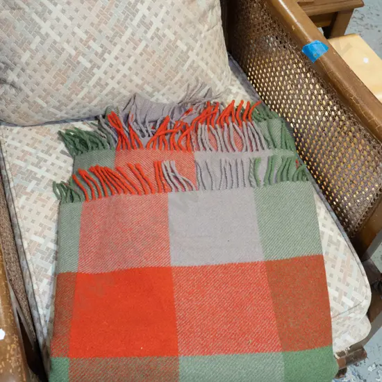 checked woollen Kaiapoi travel rug - some holes