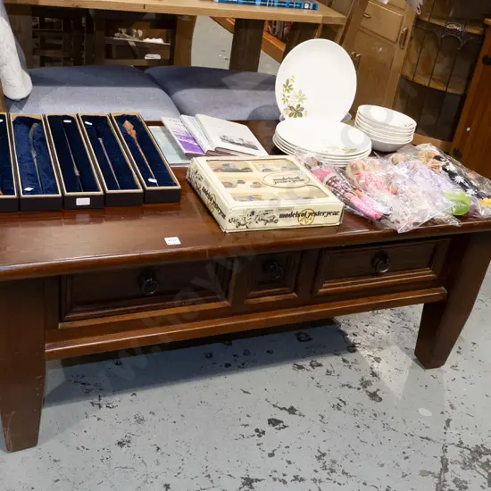 dark stained solid pine coffee table with 3 drawers