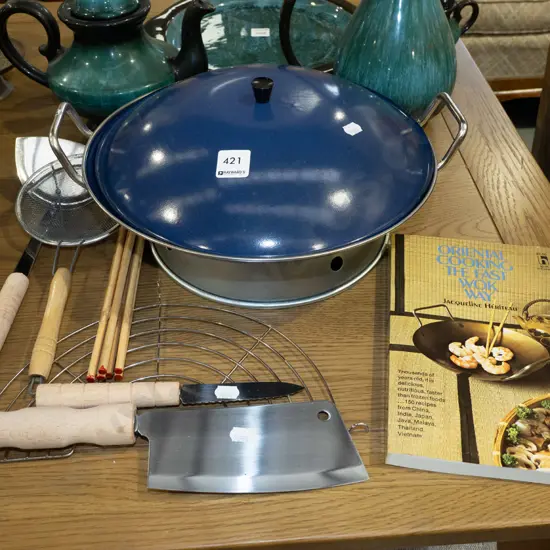 as new wok, various utensils and cookbook