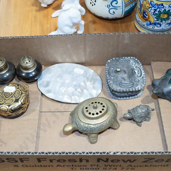 box; ornamental turtles, salt and peppers, mother of pearl belt buckle etc