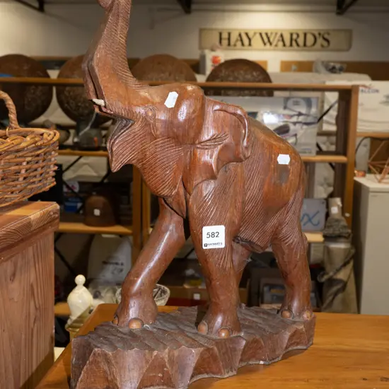 carved wooden elephant figurine - no tusk