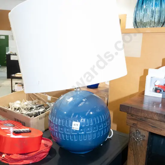 large modern blue ceramic ball based table - shade needs a tighten