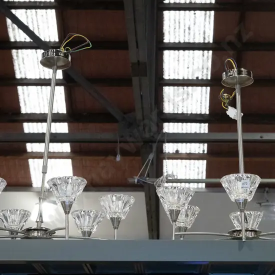 pair of matching 6 light chrome and glass light fittings