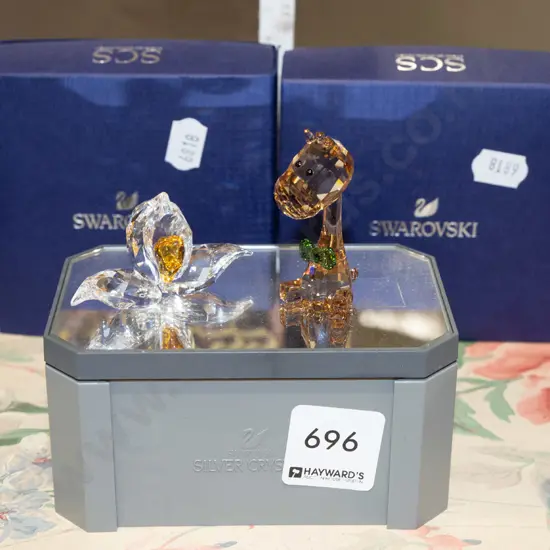 2x boxed Swarvoski ornaments on mirrored stand