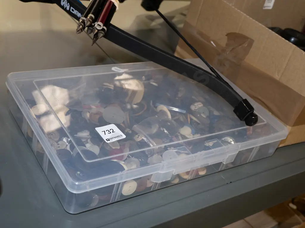 plastic container of various buttons Image 1++