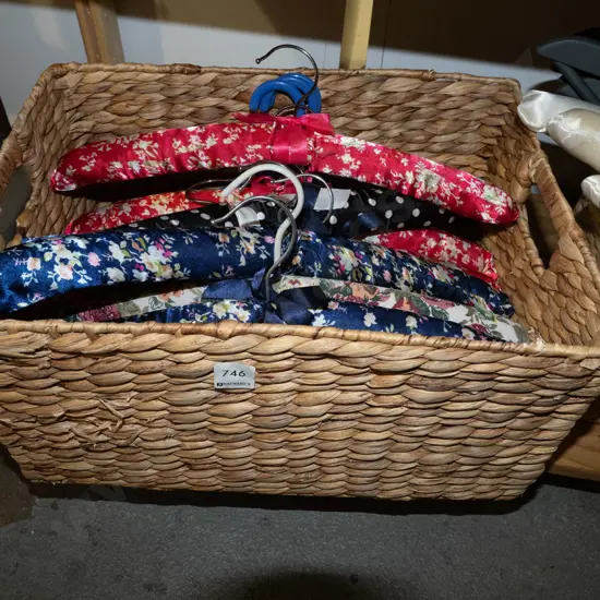 basket; multi coloured fabric coat hangers