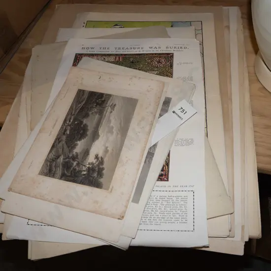 assorted unframed prints and maps