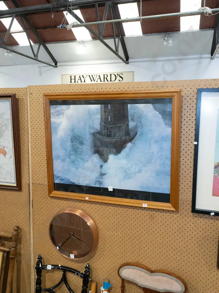 framed poster print - base of lighthouse in rough sea Image 1++
