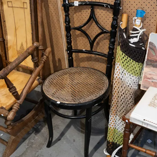 rattan upholstered black painted chair
