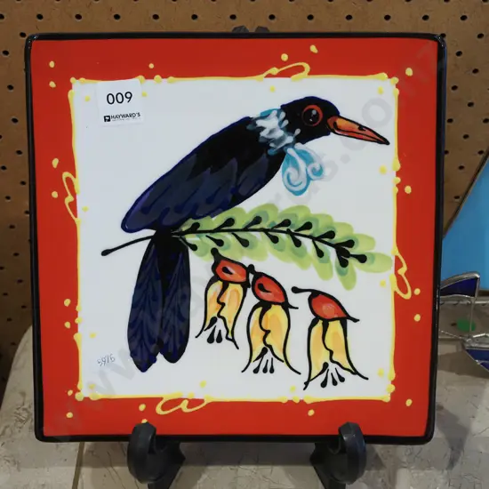 NZ studio pottery plate - tui in kowhai